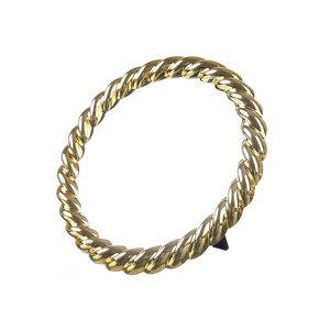 Elegant gold twisted rope bangle with a polished metallic finish on white background