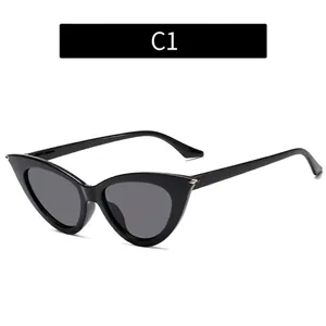 Chic black cat eye sunglasses for women with dark lenses and silver metal accents