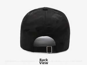 Detail view of the black camouflage baseball cap featuring an adjustable metal buckle back