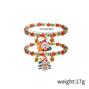 Detail of Christmas beaded bracelet set with Santa Claus, snowflake and bell charms