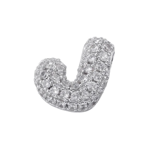 Macro view of silver bubble letter J pendant featuring detailed 5A cubic zirconia stones