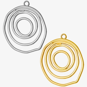 Detailed view of silver and gold irregular concentric circle pendants in 304 stainless steel
