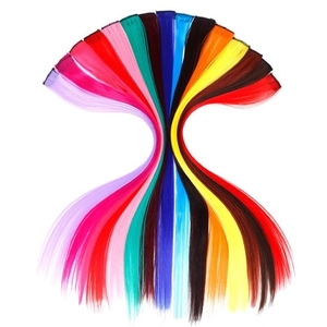 Detailed fan arrangement of colorful clip-in synthetic hair extensions on white background