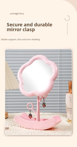 Pink flower-shaped desktop makeup mirror with jewelry rack and wavy storage base