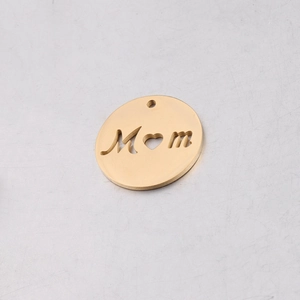 Detail of 20mm golden stainless steel Mom pendant with heart cutout for DIY jewelry
