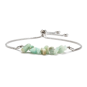 Detailed macro of green crystal chips with adjustable stainless steel slider chain