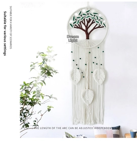 Detail of tree of life macrame wall hanging with handmade tassels and green beads