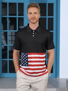 Close-up of men's short-sleeve polo shirt featuring American flag print on black fabric