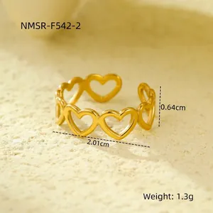 Macro view of gold-plated heart ring with 2.01cm diameter and 1.3g weight details