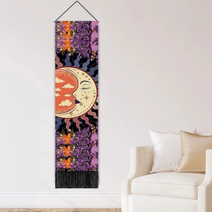 Hanging sun and moon mandala tapestry with black tassels and botanical patterns