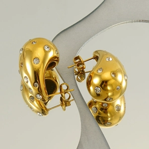 Boucles d'oreilles goutte en or 18K avec zircons scintillants et reflet miroir chic