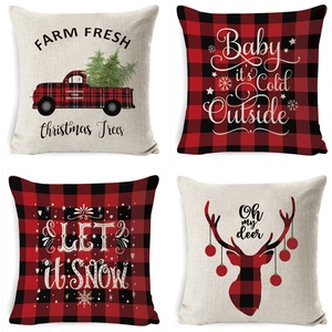 Set of four Christmas linen pillow covers with red truck and reindeer patterns