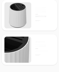 Detail of a rotating white knife holder with vertical stripes and smooth rounded edges