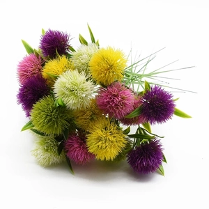 Colorful artificial dandelion bouquet with purple, yellow and pink flowers for home decor