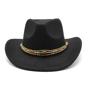 Detail of black felt cowboy hat featuring ethnic colorful beads and a tiger eye stone