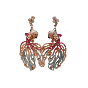 Exquisite vintage goldfish earrings with pink and blue rhinestones on a white background