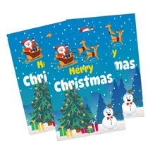 Detail of starry blue Christmas gift bags with colorful Santa and reindeer illustrations
