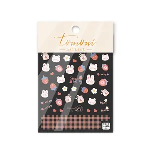 5D Embossed nail art stickers featuring cute strawberry rabbit designs for manicure