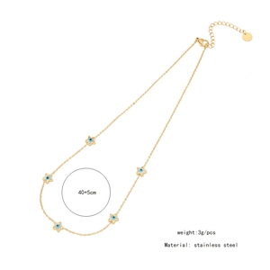 Detail of 40+5cm stainless steel gold chain featuring five star evil eye pendants