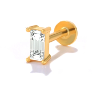 Macro shot of gold S925 silver flat back stud earring with emerald cut zircon stone