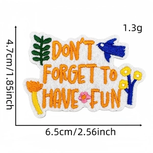 Detailed view of Don't Forget To Have Fun embroidery patch with 4.7cm x 6.5cm size label