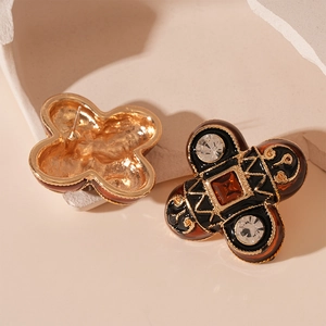 Vintage-Ohrstecker mit Goldrahmen, schwarzer Emaille und Bernstein-Kristallen im Barockstil