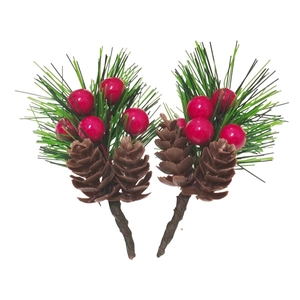Detailed view of artificial Christmas picks with red berries, pine needles and mini cones