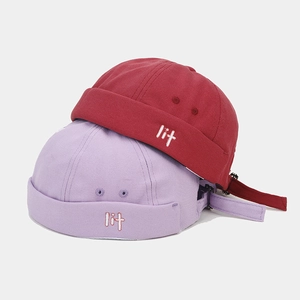 Vintage cotton docker hats in burgundy and light purple with 'lit' embroidery detail