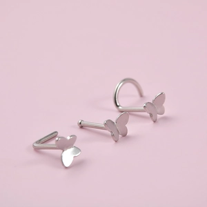 Three-piece silver butterfly nose studs set with L-shape, straight, and screw posts