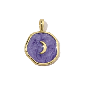Detail of a purple starry sky round pendant with a golden crescent moon and glittery finish