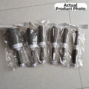 Detailed view of professional ceramic ionic round hair brushes with nano technology