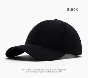 Close-up of premium black faux suede baseball cap showing refined fabric texture and stitching