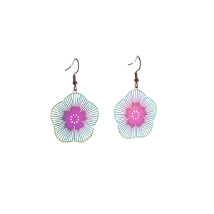 Detail of colorful gradient hollow petal earrings in bohemian retro aesthetic design