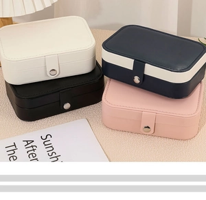 Detailed top view of rectangular PU leather jewelry boxes in four elegant colors