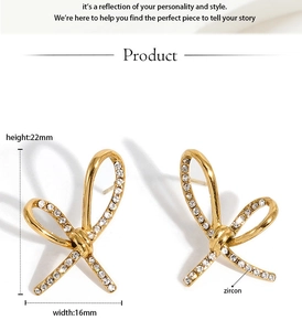 Detailed close-up of 316 stainless steel bow earrings with sparkling zircon accents
