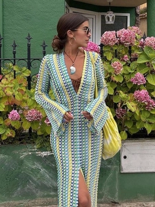 Bohemian V-neck crochet maxi dress with multi-color striped patterns and long sleeves