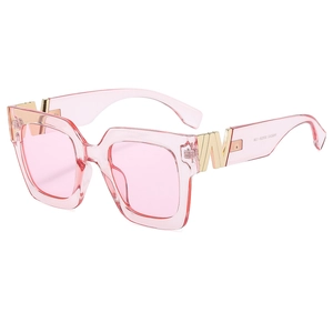 Pink square sunglasses with transparent frames and golden W metal accent on the side