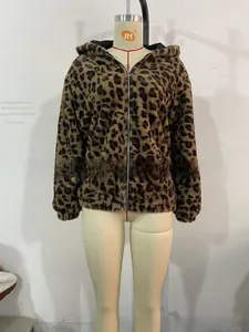 Detail shot of leopard print faux fur jacket with warm hood and front zipper texture