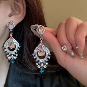Vintage fan-shaped drop earrings with pink water drop stones and silver pin settings