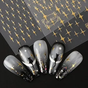 Metallic gold star nail art stickers with ultra-thin adhesive backing and star patterns