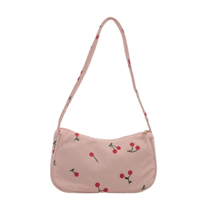 Pink corduroy underarm bag with red cherry print and slender shoulder strap on white backdrop
