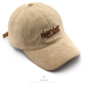 Close-up of the vintage corduroy fabric and New York embroidery on the baseball cap