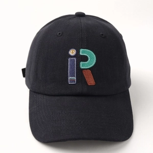 Macro detail of the 3D multi-color iR embroidery on black cotton twill baseball cap