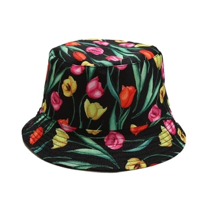Reversible bucket hat with colorful tulip flower prints on a classic black base fabric