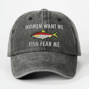 Detailed embroidery of fish and text on a vintage washed grey cotton baseball cap