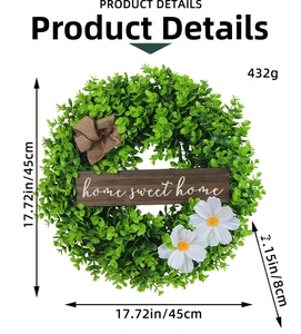 Detail view of 45cm green wreath with home sweet home sign and white daisies decor