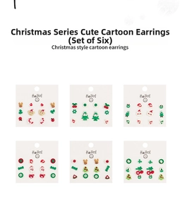 Detail of Christmas stud earring set featuring reindeer, snowman and tree designs