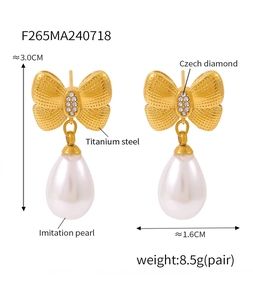 Detail showing crystal bow and pearl tassel earrings with 3.0cm height dimensions
