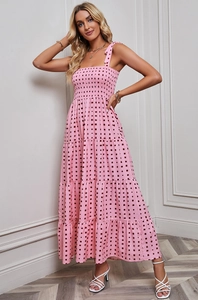 Detail of pink floral backless maxi dress with elastic pleated bust and tiered hem