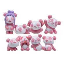 Detail set of eight cute panda mini figurines in various playful poses for desk decor